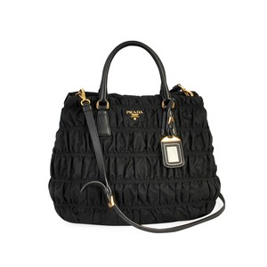 https://dbiyorq10n2b9.cloudfront.net/product-images/CBAGPRA210/PRADA-Tessuto-Gaufre-Shoulder-Bag-Black-front.jpg.webp