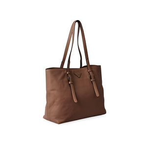 https://dbiyorq10n2b9.cloudfront.net/product-images/CBAGPRA213/PRADA-Saffiano-Shopper-Tote-Beige-angle.jpg.webp