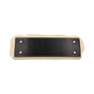 https://dbiyorq10n2b9.cloudfront.net/product-images/CBAGTOD0022/TODS-Leather-Canvas-Shoulder-Bag-Black-Ivory_6.jpg.webp
