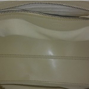 https://dbiyorq10n2b9.cloudfront.net/product-images/CBAGTOD104/TODS-Leather-Shoulder-Bag-Tan-interior.jpg.webp