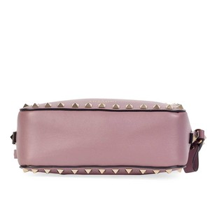 https://dbiyorq10n2b9.cloudfront.net/product-images/CBAGVA102/VALENTINO-Rockstud-Camera-Crossbody-Bag-Bottom.jpg.webp