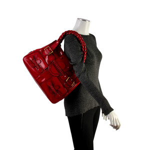 https://dbiyorq10n2b9.cloudfront.net/product-images/CBAGVA112/VALENTINO-Patent-Leather-Histoire-Satchel-Red-mannequin.jpg.webp