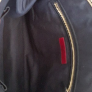 https://dbiyorq10n2b9.cloudfront.net/product-images/CBAGVA113/VALENTINO-Leather-Studded-Tote-Black-interior.jpg.webp