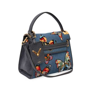 https://dbiyorq10n2b9.cloudfront.net/product-images/CBAGVAL0002/VALENTINO-Denim-Butterfly-My-Rockstud-Bag-Blue-angle.jpg.webp