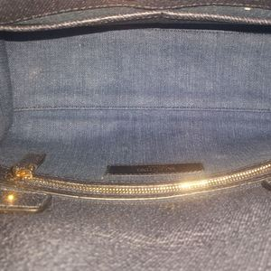 https://dbiyorq10n2b9.cloudfront.net/product-images/CBAGVAL0002/VALENTINO-Denim-Butterfly-My-Rockstud-Bag-Blue-interior.jpg.webp