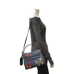 https://dbiyorq10n2b9.cloudfront.net/product-images/CBAGVAL0002/VALENTINO-Denim-Butterfly-My-Rockstud-Bag-Blue-mannequin.jpg.webp