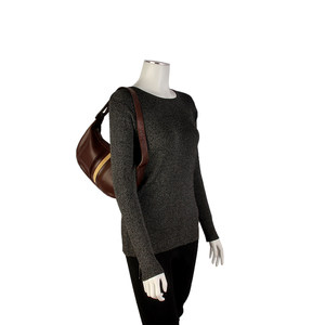 https://dbiyorq10n2b9.cloudfront.net/product-images/CBAGVER103/VERSACE-Vintage-Leather-Clutch-Brown-mannequin.jpg.webp