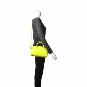 https://dbiyorq10n2b9.cloudfront.net/product-images/CBAGYSL0073/SAINT-LAURENT-Leather-Duffle-Bag-Neon-Yellow.jpg.webp