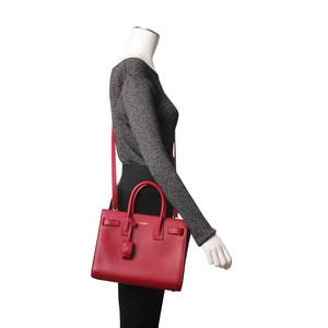 https://dbiyorq10n2b9.cloudfront.net/product-images/CBAGYSL0087/SAINT-LAURENT-Leather-Baby-Sac-De-Jour-Rouge-Merlot.jpg.webp