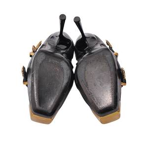 https://dbiyorq10n2b9.cloudfront.net/product-images/CSHOAMQ0034/ALEXANDER-MCQUEEN-Leather-Embossed-Buckle-Ankle-Boots-Black-.jpg.webp