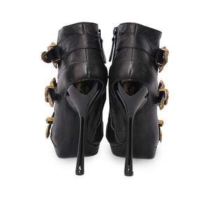 https://dbiyorq10n2b9.cloudfront.net/product-images/CSHOAMQ0034/ALEXANDER-MCQUEEN-Leather-Embossed-Buckle-Ankle-Boots-Black-3.jpg.webp