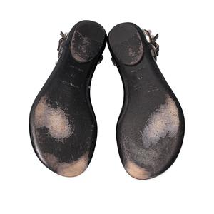 https://dbiyorq10n2b9.cloudfront.net/product-images/CSHOBAL0050/BALENCIAGA-Leather-Studded-Gladiator-Sandals-Black-soles.jpg.webp