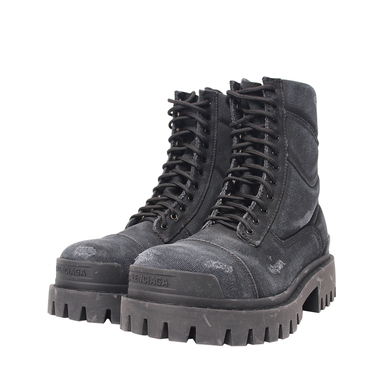 BALENCIAGA Canvas Distressed Combat Strike Boots Black | Luxity