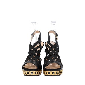 https://dbiyorq10n2b9.cloudfront.net/product-images/CSHOCAS0046/CASADEI-Leather-Caged-Platform-Sandals-Black-Gold_4.jpg.webp