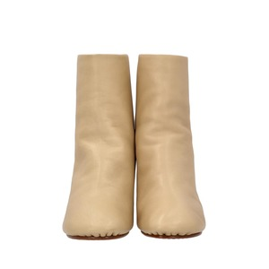 https://dbiyorq10n2b9.cloudfront.net/product-images/CSHOCEL0015/CELINE-Leather-Ankle-Boots-Beige-Brown_3.jpg.webp
