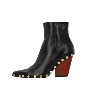 https://dbiyorq10n2b9.cloudfront.net/product-images/CSHOCEL0019/CELINE-Leather-Rodeo-Studded-Ankle-Boots-Black_4.jpg.webp