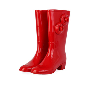 https://dbiyorq10n2b9.cloudfront.net/product-images/CSHOCH121/CHANEL-Rubber-Camellia-Flower-Rain-Boots-Red-S-41-7.5-angle.jpg.webp