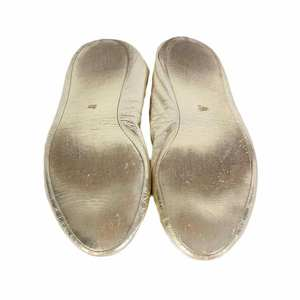 https://dbiyorq10n2b9.cloudfront.net/product-images/CSHOCHA101/CHANEL-Gold-Leather-Slippers-Bottom.jpg.webp