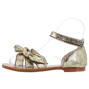 https://dbiyorq10n2b9.cloudfront.net/product-images/CSHOCHL0011/CHLOE-Leather-Kids-Distressed-Bow-Sandals-Gold_3.jpg.webp