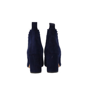 https://dbiyorq10n2b9.cloudfront.net/product-images/CSHOCHL0014/CHLOE-Suede-Scallop-Block-Heel-Ankle-Boots-Navy_1.jpg.webp