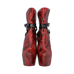 https://dbiyorq10n2b9.cloudfront.net/product-images/CSHOCL0198/CHRISTIAN-LOUBOUTIN-Python-Platform-Equestria-Boots-Red_1.jpg.webp