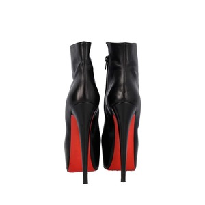 https://dbiyorq10n2b9.cloudfront.net/product-images/CSHOCL0411/CHRISTIAN-LOUBOUTIN-Leather-Daffodile-Boots-Black-.._4.jpg.webp