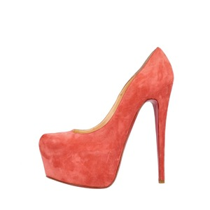 https://dbiyorq10n2b9.cloudfront.net/product-images/CSHOCL0456/CHRISTIAN-LOUBOUTIN-Suede-Daffodile-Pumps-Coral_1.jpg.webp