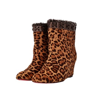 https://dbiyorq10n2b9.cloudfront.net/product-images/CSHOCL0595/CHRISTIAN-LOUBOUTIN-Pony-Hair-Leopard-Print-Wedge-Ankle-Boots_2.jpg.webp