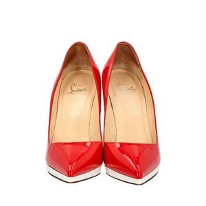 https://dbiyorq10n2b9.cloudfront.net/product-images/CSHOCL0602/CHRISTIAN-LOUBOUTIN-Patent-Pigalle-Plato-Pumps-Red-White_3.jpg.webp