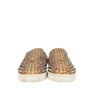 https://dbiyorq10n2b9.cloudfront.net/product-images/CSHOCL0641/CHRISTIAN-LOUBOUTIN-Python-Spikes-Roller-Boat-Slip-On-Sneakers-Beige-_3.jpg.webp