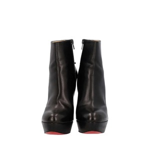 https://dbiyorq10n2b9.cloudfront.net/product-images/CSHOCL0661/CHRISTIAN-LOUBOUTIN-Leather-Pony-Hair-Cuffs-Armony-Platform-Boots-Black_3.jpg.webp