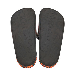 https://dbiyorq10n2b9.cloudfront.net/product-images/CSHODG0049/DOLCE-GABBANA-Rubber-Royals-Slides-Black-Orange_5.jpg.webp