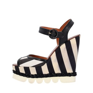https://dbiyorq10n2b9.cloudfront.net/product-images/CSHODG0201/DOLCE-GABBANA-Raffia-Striped-Wedge-Sandals-Black-White_1.jpg.webp