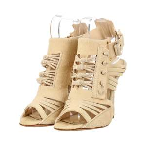 https://dbiyorq10n2b9.cloudfront.net/product-images/CSHOGIV0026/GIVENCHY-Pony-Hair-Gladiator-Sandals-Beige_1.jpg.webp
