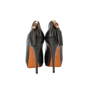 https://dbiyorq10n2b9.cloudfront.net/product-images/CSHOGUC0122/GUCCI-Leather-Betty-Bamboo-Tassel-Ankle-Boots-Black-S-38-5-Back.jpg.webp