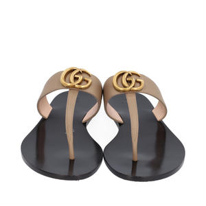 https://dbiyorq10n2b9.cloudfront.net/product-images/CSHOGUC0166/GUCCI-Double-G-Thong-Sandals-Beige-Black_1.jpg.webp