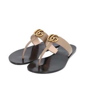 https://dbiyorq10n2b9.cloudfront.net/product-images/CSHOGUC0166/GUCCI-Double-G-Thong-Sandals-Beige-Black_2.jpg.webp