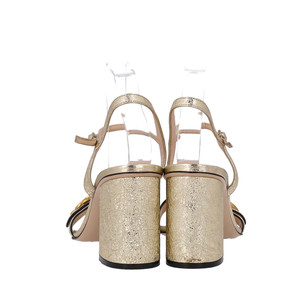 https://dbiyorq10n2b9.cloudfront.net/product-images/CSHOGUC0263/GUCCI-Leather-GG-Block-Heel-Sandals-Gold_3.jpg.webp