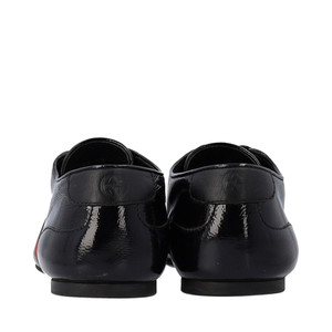 https://dbiyorq10n2b9.cloudfront.net/product-images/CSHOGUC0291/GUCCI-Patent-Web-Sneakers-Black_4.jpg.webp