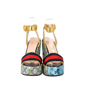 https://dbiyorq10n2b9.cloudfront.net/product-images/CSHOGUC0321/GUCCI-GG-Blooms-Wedge-Sandals-Multicolour_3.jpg.webp