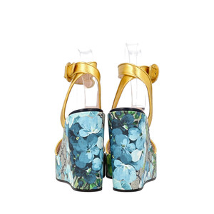https://dbiyorq10n2b9.cloudfront.net/product-images/CSHOGUC0321/GUCCI-GG-Blooms-Wedge-Sandals-Multicolour_4.jpg.webp