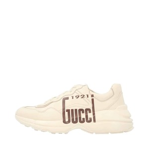https://dbiyorq10n2b9.cloudfront.net/product-images/CSHOGUC0525/GUCCI-Leather-1921-Rhyton-Sneakers-Ivory_1.jpg.webp
