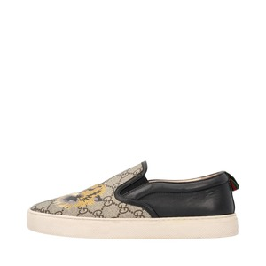 https://dbiyorq10n2b9.cloudfront.net/product-images/CSHOGUC0544/GUCCI-GG-Supreme-Tiger-Slip-On-Sneakers-Beige_1.jpg.webp