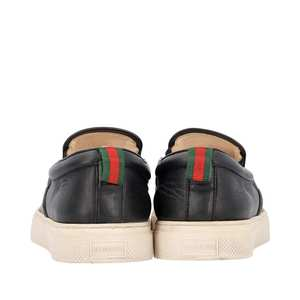 https://dbiyorq10n2b9.cloudfront.net/product-images/CSHOGUC0544/GUCCI-GG-Supreme-Tiger-Slip-On-Sneakers-Beige_2.jpg.webp