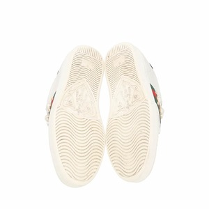 https://dbiyorq10n2b9.cloudfront.net/product-images/CSHOGUC0561/GUCCI-Leather-Ace-Faux-Pearl-Spike-Sneakers-White_5.jpg.webp
