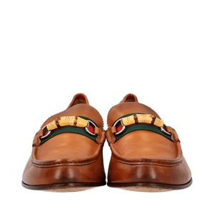 https://dbiyorq10n2b9.cloudfront.net/product-images/CSHOGUC0613/GUCCI-Leather-Web-Bamboo-Loafers-Brown_3.jpg.webp