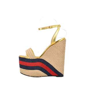 https://dbiyorq10n2b9.cloudfront.net/product-images/CSHOGUC0758/GUCCI-Leather-Espadrille-Wedges-Gold_1.jpg.webp
