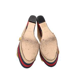 https://dbiyorq10n2b9.cloudfront.net/product-images/CSHOGUC0758/GUCCI-Leather-Espadrille-Wedges-Gold_5.jpg.webp