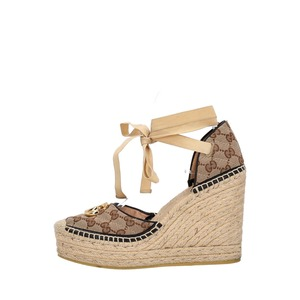 https://dbiyorq10n2b9.cloudfront.net/product-images/CSHOGUC0822/GUCCI-Canvas-GG-Wedge-Espadrilles-Beige_1-1.jpg.webp