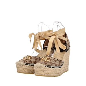 https://dbiyorq10n2b9.cloudfront.net/product-images/CSHOGUC0822/GUCCI-Canvas-GG-Wedge-Espadrilles-Beige_2-1.jpg.webp